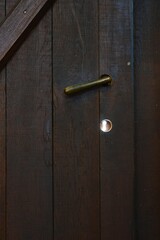 Fototapeta premium an old wooden brown door to the church