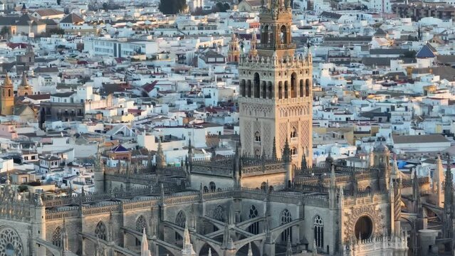 Aerial tele shot of Giralda bell tower in Seville old town. Catedral de Sevilla