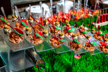 Cold strawberry lemonade in mason jar isolated