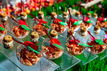 Cold strawberry lemonade in mason jar isolated