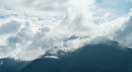 Fototapeta premium Jade Dragon Snow Mountain covered with fog