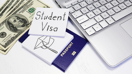 Student Visa approval with passport and notebook. Document with passport, apply and permission for...