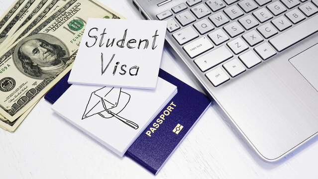 Student Visa approval with passport and notebook. Document with passport, apply and permission for foreigner country