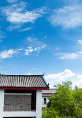 Fototapeta na wymiar Chinese style roof under blue sky