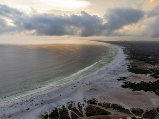 Cloud Sunset Amazing Praia Grande with turquoise waters in Arraial do Cabo, Rio de Janeiro, Brazil
