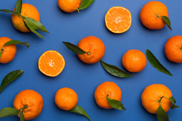 Flat lay with fresh mandarines on color background. Top view