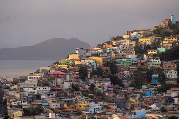 Obraz premium community of Arraial do Cabo, Rio de Janeiro, Small houses on the hill.