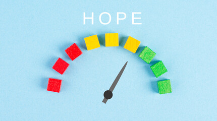 The word hope is standing on a paper, positive mindset, optimism for the future, progress bar,...