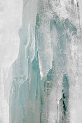 Ice and icicle formation. Beautiful shape of a melting icicle. Crooked icicles
 - obrazy, fototapety, plakaty