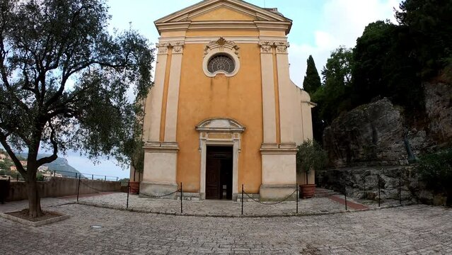 TILT SHOT - The fa&ccedil;ade of the Church of Notre Dame de l'Assomption (Notre-Dame-de-l'Assomption) in Eze, France. A Baroque church nestled in the medieval village.