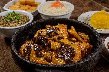 Chicken with brown gravy. Traditional cuisine from the northeast of Brazil.