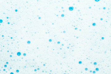 Soap foam and bulbs - background for design. Home cleaning.