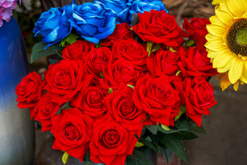 A bouquet of bright red beautiful roses fake flowers