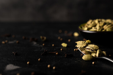 Cardamom on a black table 
