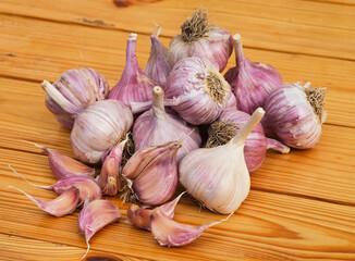A Heap of garlic on wooden background