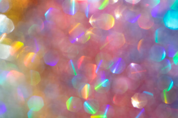 Abstract defocused multicolored background with shining glitter.Good as overlay layer.