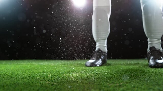 Super slow motion of falling soccer ball on lawn. Filmed on high speed cinema camera, 1000fps. Speed ramp effect.