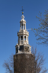 Montelbaanstoren - tower from 1516, located along Oudeshans canal in Amsterdam Centrum. Amsterdam, Netherlands.