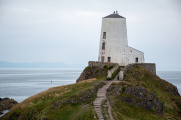 Fototapeta na wymiar Tŵr Mawr Lighthouse at Ynys Llanddwyn, Anglesey, on the north Wales coast