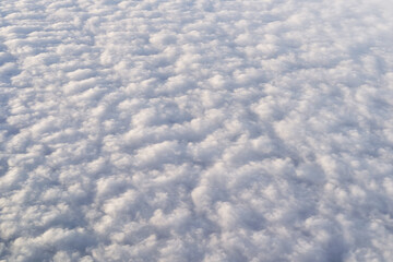 View of clouds from above. Heaven background. Clear cloudscape