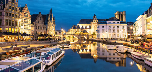 Ghent old town night skyline and Leie river, Belgium