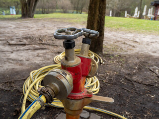 Watering hydrants in the park. Watering system.
