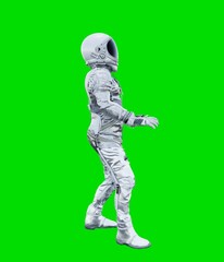 Astronaut isolated on green background