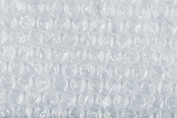 The texture of the packaging air-bubble film on a White background in full screen