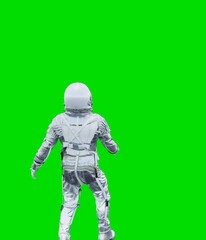 Astronaut isolated on green background