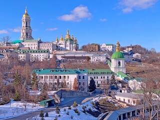 Fototapeta premium Kyiv Ukraine Lavra orthodox monastery. Majestic landscape of ancient monastery, churches, cathedral, temples with golden domes. Christianity religion, spirituality, worship. Kiev Pechersk Lavra.
