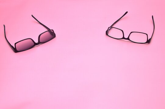 Pink Glasses On A White Background