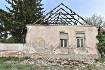 Old house with demolished roof