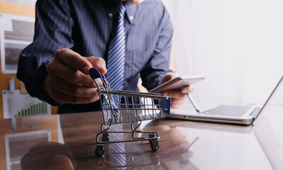 Businesswoman phone and laptop using , online shopping concept.