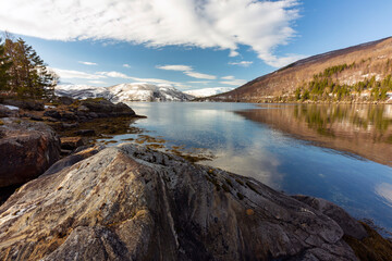 Norwegian Fjords. Mountains, snow, sea in Lapland. Norway a landscape in nature