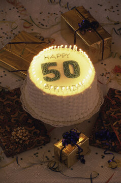 Birthday cake with lit candles