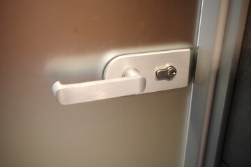 glass door handle in office building