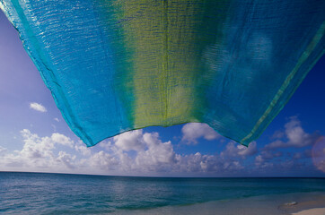 Towel fluttering on the beach