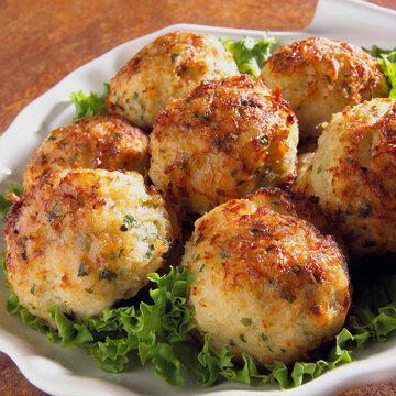 Close-up of crab cakes in a bowl