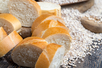 pieces of wheat baguette on a cutting board