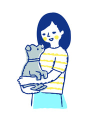 子犬を抱っこしている笑顔の女性