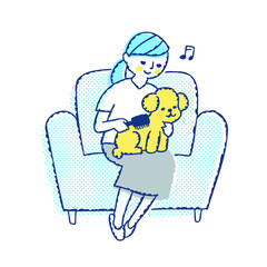 トイプードルのグルーミングをしている女性