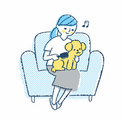 トイプードルのグルーミングをしている女性