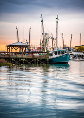 colorful fishing pier and boats, Charleston South Carolina - 496370911