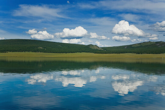 Reflection of clouds in a lake, Lake Khovsgol, Sayan Mountains, Russian-Mongolian Border