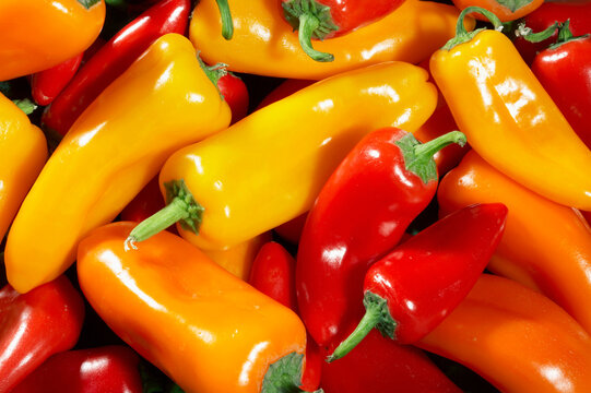 Close-up of yellow and red peppers