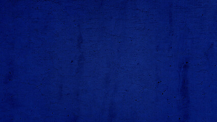Solid color plaster concrete wall texture navy blue background.