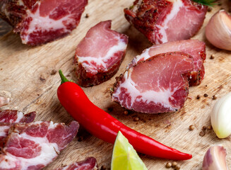 pork and bacon sliced during cooking
