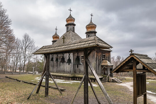 Ancient Slavic traditional wooden church. Tourist attraction at Pyrohiv park, Ukraine