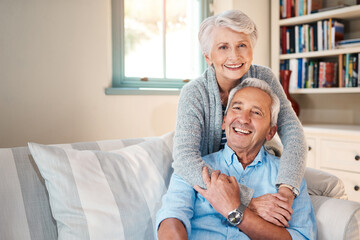 Our domestic bliss turned into golden bliss. Shot of a senior couple spending quality time at home. - Powered by Adobe