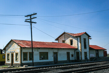 Fototapeta na wymiar Old train station with blue sky in sunny day